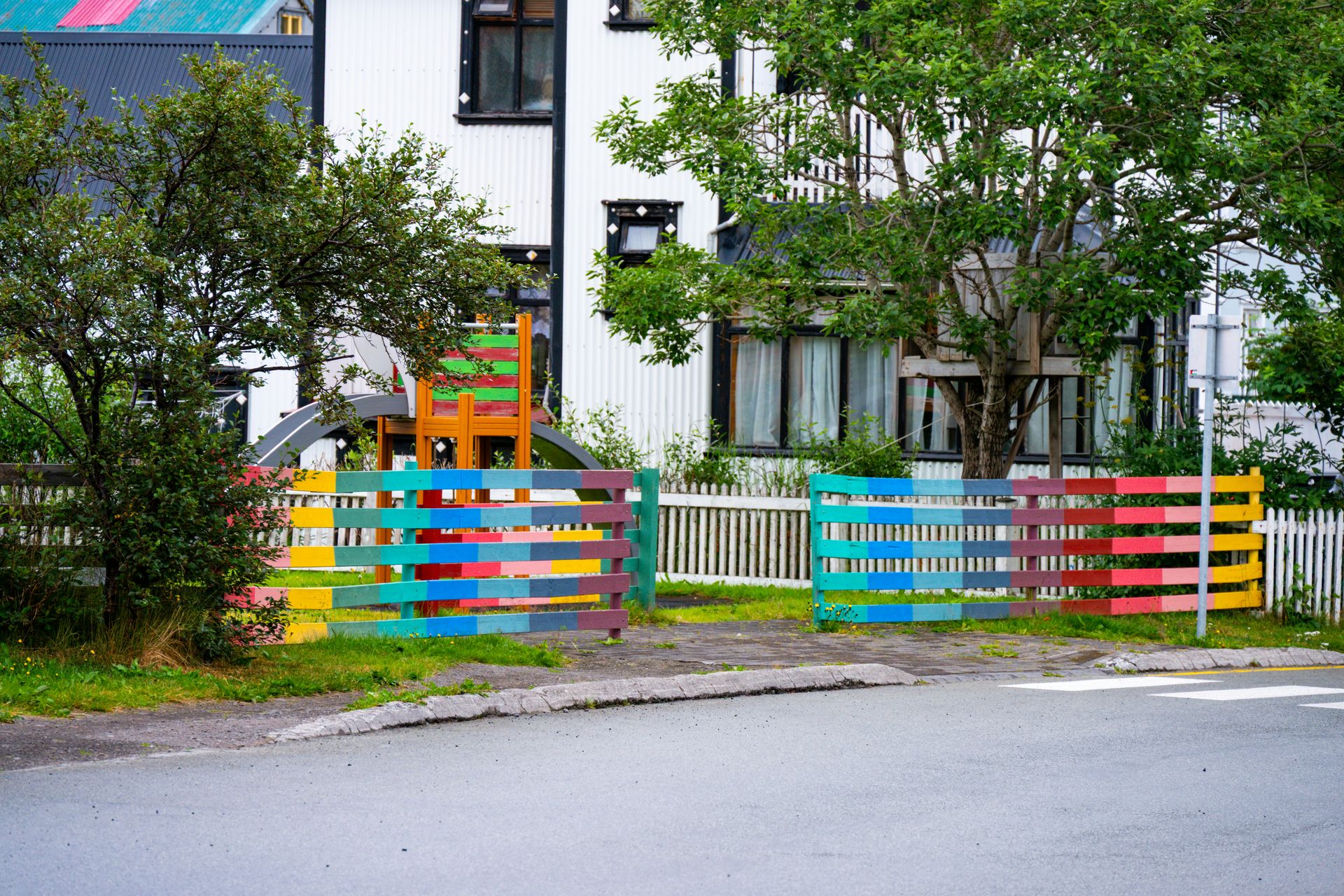 Colorful fence in front of a building